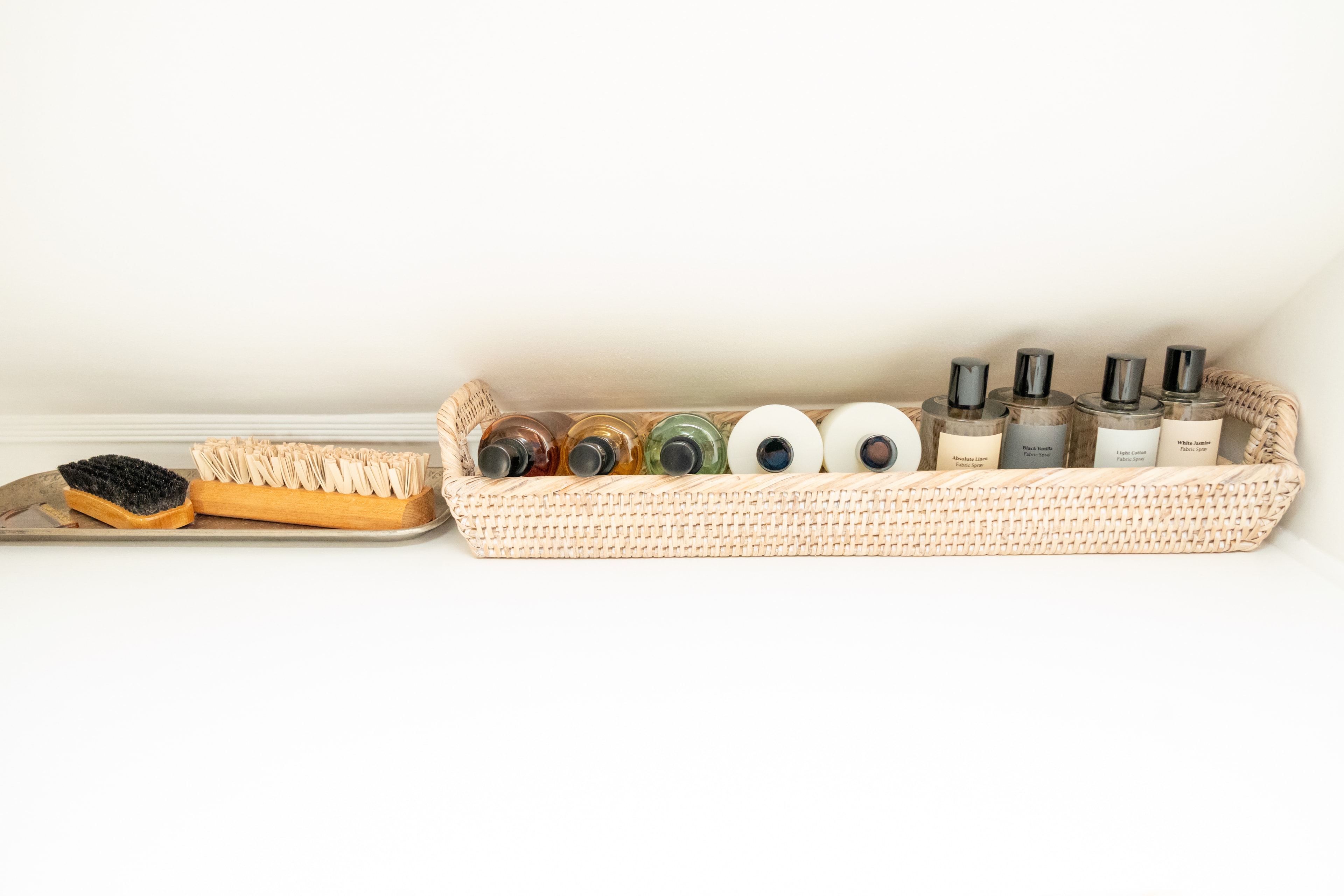 Organised bathroom with wicker tray
